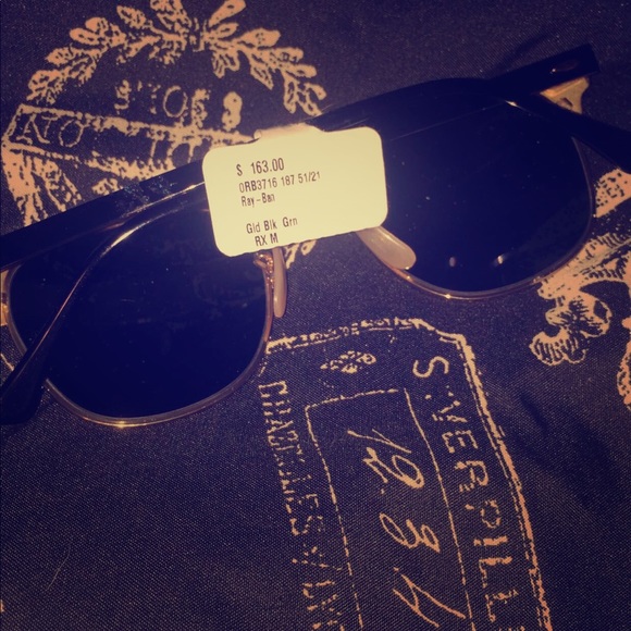 Black and Gold Ray Ban sunglasses